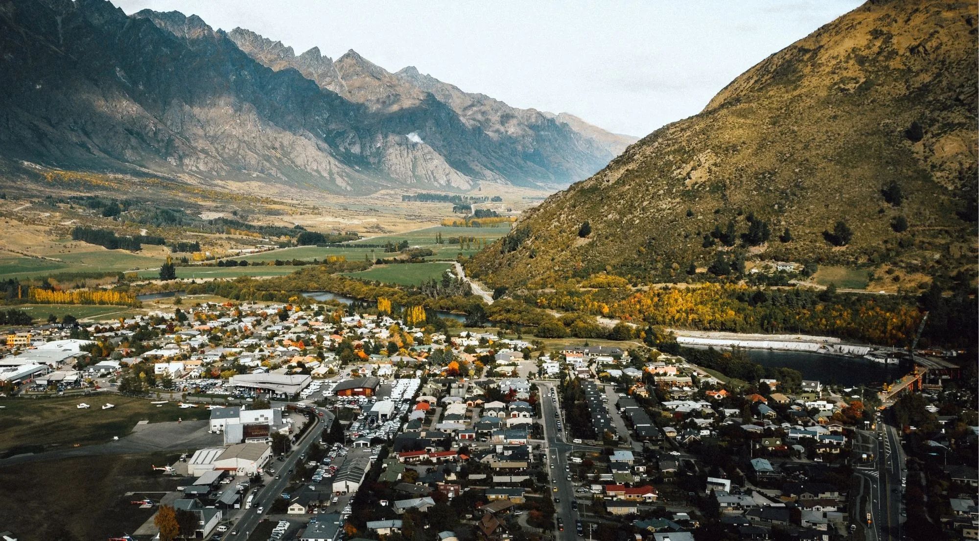 Aerial view over Frankton and the Shotover valley with the Remarkables range filling the horizon